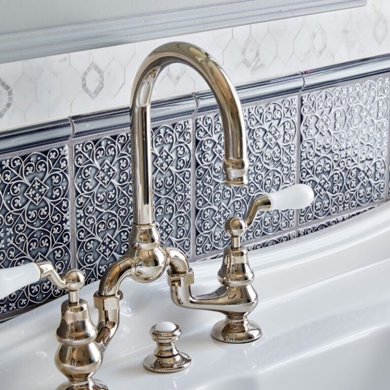 Luxurious bathroom faucet and backsplash by the best contractor in Monterey CA, Kasavan Construction.