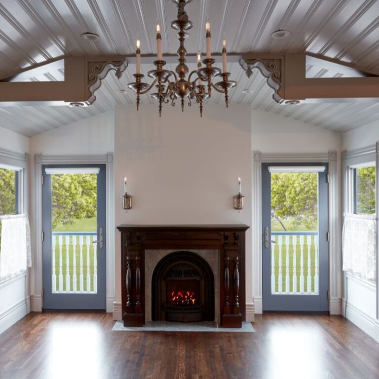 Classic parlor with a central fireplace by the best contractor in Monterey CA, Kasavan Construction (further view).